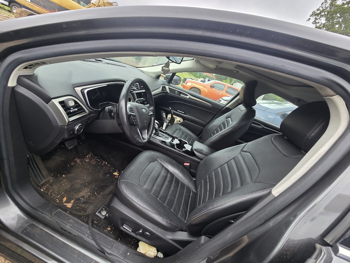Actual Ford Fusion donor photo 3; rear-left collision damage disclosed